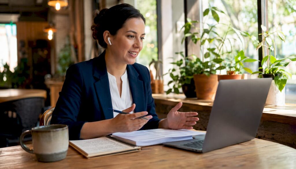 Sales professional discussing objections via video call