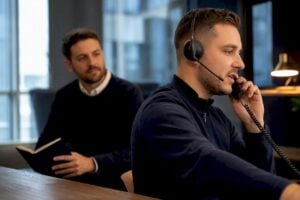 Sales manager coaching representative during call block