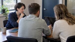 Buyers reviewing evidence after a software demo