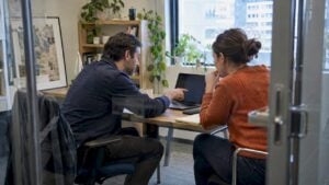 Founder coaching a rep through a live deal