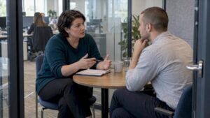Sales manager coaching a seller after training