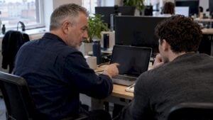 Founder coaching first sales hire through call review