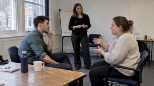 Sales reps practise a pricing objection in person