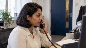 Sales professional making a live business call
